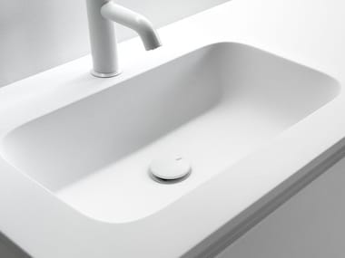 MINI ROUNDLUX - Ceramilux® washbasin with integrated countertop by Falper