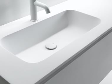 ROUNDLUX - Ceramilux® washbasin with integrated countertop by Falper