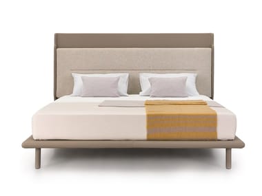 ZERO - Leather double bed with upholstered headboard by Turri